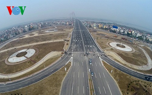 El panorama de la puente de Nhat Tan y la carretera más moderna de Hanoi - ảnh 9