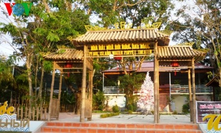 Arte de marionetas acuáticas en isla de perla Phu Quoc  - ảnh 1