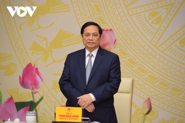 Pham Minh Chinh rencontre des hommes d’affaires à Hanoï - ảnh 1