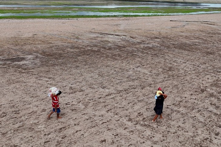 Près de 900 millions de pauvres menacées par le changement climatique - ảnh 1
