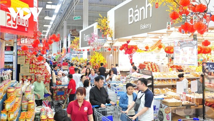 Les entreprises vietnamiennes accélèrent leur production en prévision du Nouvel an lunaire - ảnh 1