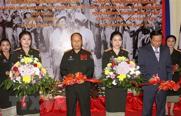 งานนิทรรศกาล 70 ปีวันทหารอาสาและผู้เชี่ยวชาญเวียดนามในประเทศลาว - ảnh 1