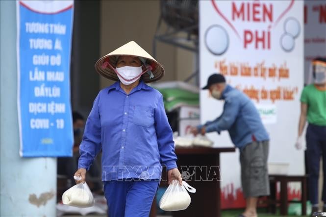 อินเดียทำโครงการตู้ “เอทีเอ็มข้าว” สนับสนุนคนจนเหมือนในเวียดนาม - ảnh 1