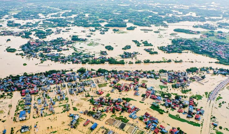 เกิดเหตุน้ำท่วมอย่างหนักในจังหวัดหลายแห่งทางภาคเหนือของเวียดนามหลังพายุแมตโม - ảnh 1