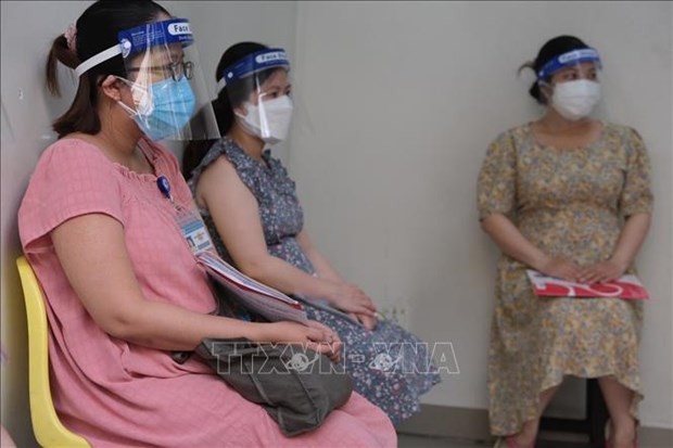 HCM City begins COVID-19 inoculation for expectant women - ảnh 1