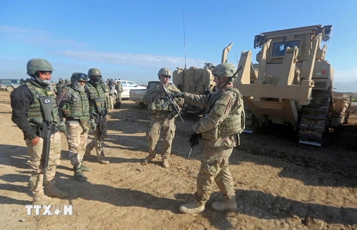 Iraq, US agree to phased coalition troop pullout  - ảnh 1