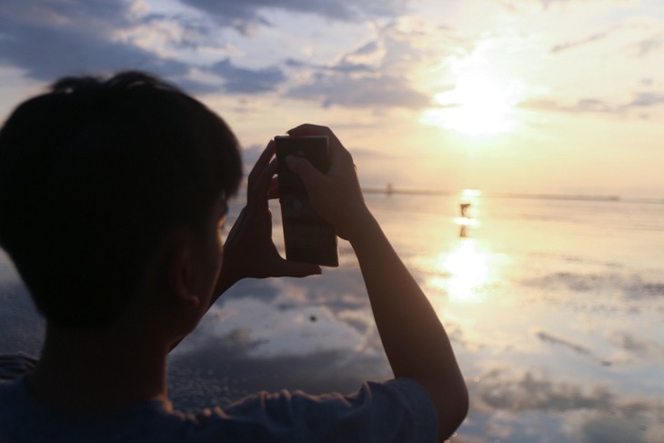 ความงามที่สงบเงียบบนชายหาดกวางลาง จังหวัดท้ายบิ่ง - ảnh 11