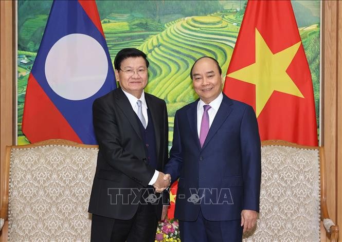 Премьер-министр Лаоса завершил визит во Вьетнам и участие в 43-м заседании вьетнамо-лаосской межправительственной комиссии по двустороннему сотрудничеству - ảnh 1