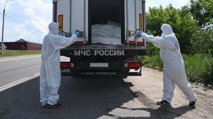 РФ передала Украине еще 1200 тел погибших - ảnh 1