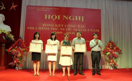 Tổng kết công tác phi chính phủ nước ngoài năm 2014 - ảnh 2