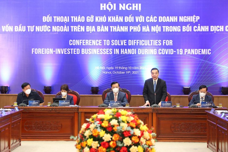 Hà Nội đối thoại tháo gỡ khó khăn cho doanh nghiệp  - ảnh 1