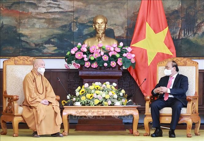 พุทธศาสนาเวียดนามมีบทบาทสำคัญในการปกป้องประเทศและค้ำประกันชีวิตที่สงบสุขให้แก่ประชาชน - ảnh 1