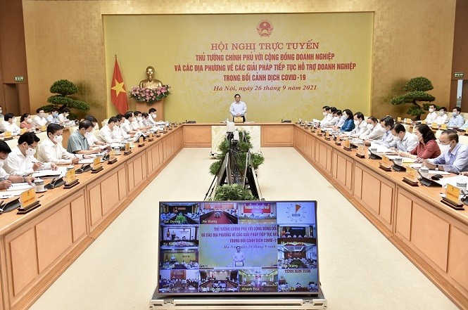 เพิ่มพลังให้แก่สถานประกอบการในการฟันฝ่าอุปสรรคจากการแพร่ระบาดของโรคโควิด -19 - ảnh 2