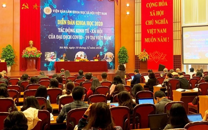 Covid-19 pandemic impacts reviewed in Vietnam - ảnh 1