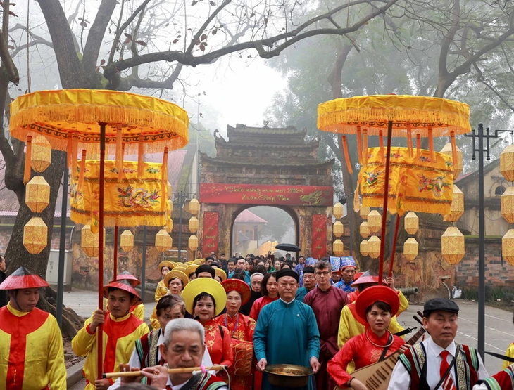 Preservar la identidad cultural nacional a través de rituales tradicionales durante el Tet  - ảnh 1