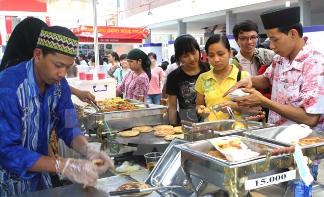 งานมหกรรมอาหารภายใต้หัวข้อ “ประชาคมอาเซียนกับเพื่อนมิตรชาวต่างชาติ” - ảnh 1