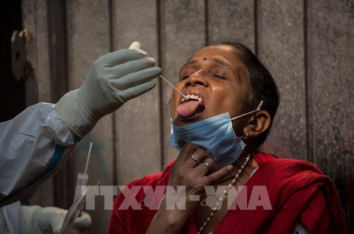 ทั่วโลกมีผู้ติดเชื้อโรคโควิด -19 กว่า 50 ล้านคน - ảnh 1