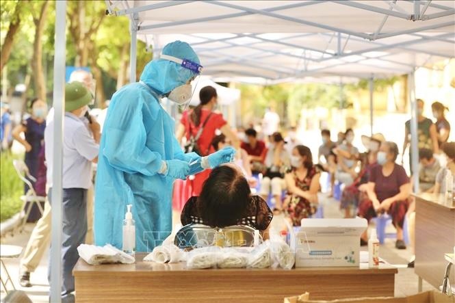 สถานการณ์การแพร่ระบาดของโรคโควิด-19 ในเวียดนามและทั่วโลกในวันที่ 23 สิงหาคม - ảnh 1