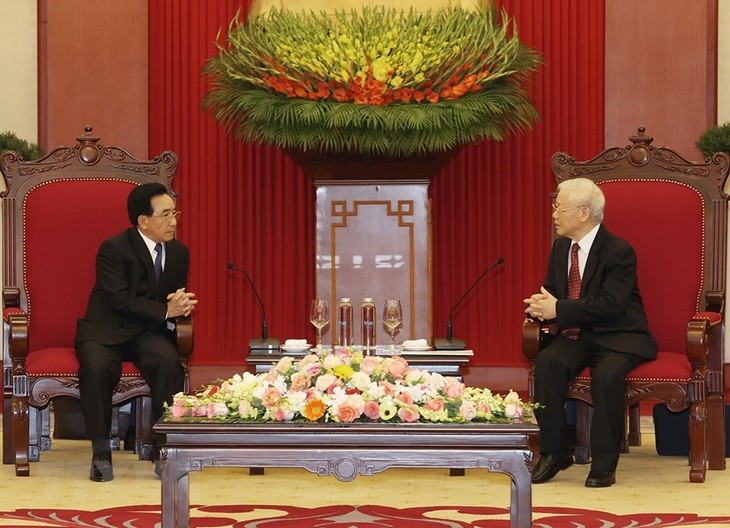 เลขาธิการใหญ่พรรคฯ เหงียนฟู้จ่อง ให้การต้อนรับนายกรัฐมนตรีลาว - ảnh 1