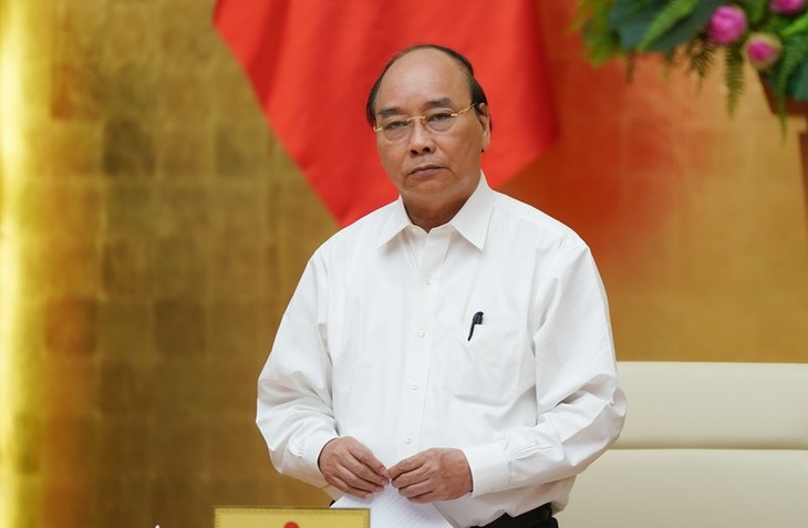 Premierminister Nguyen Xuan Phuc leitet Regierungssitzung über Covid-19-Bekämpfung - ảnh 1