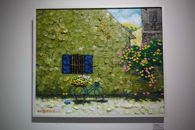 Blumenstraßen Hanois in Gemälde von Nguyen Hoang Long - ảnh 1