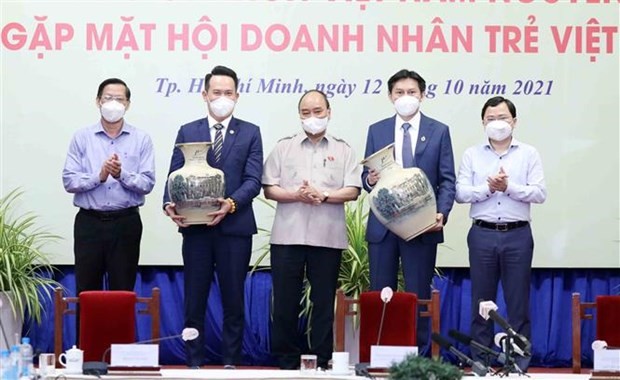 President pledges to help entrepreneurs tackle obstacles - ảnh 1