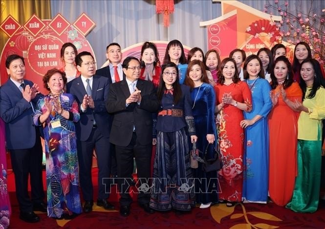 PM joins Tet celebration with Vietnamese community in Poland - ảnh 1