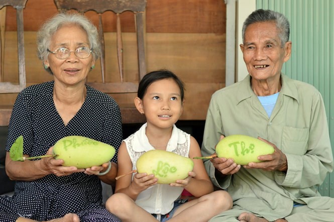 เยือนแหล่งผลิตผลไม้ประดับวันตรุษเต๊ต - ảnh 2