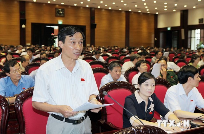 National Assembly discusses revised Enterprise Law - ảnh 1