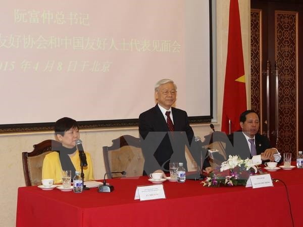 Party leader meets leaders of China’s People’s Association for Friendship with Foreign Countries - ảnh 1