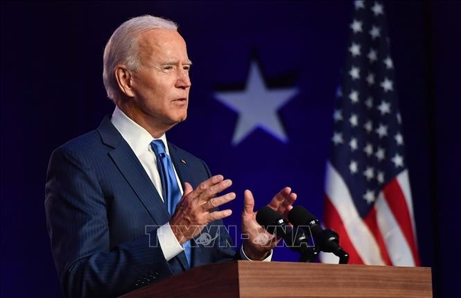  ທ່ານ Joe Biden ​ປະ​ທາ​ນາ​ທິບ​ໍ​ດີ​ຫາກໍ່​ໄດ້​ຮັບ​ການ​ເລືອກ​ຕັ້ງ ສົ່ງ​ສານ​ສາ​ມັກ​ຄີ, ສະ​ໜິດ​ຕິດ​ພັນ ແລະ ສ້າງ​ປະ​ເທດ​ຄືນ​ໃໝ່​ເນື່ອງ​ໃນ​ໂອ​ກາດ​ປີ​ໃໝ່ - ảnh 1