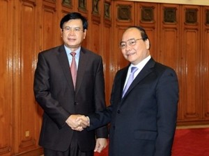 Deputy PM hosts Lao economic commission head - ảnh 1