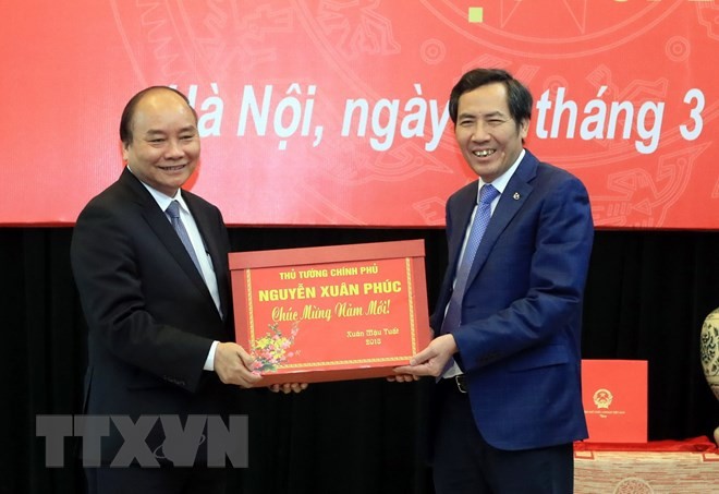 PM Nguyen Xuan Phuc works with Nhan Dan newspaper - ảnh 1