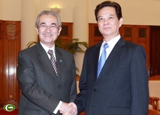 PM Nguyen Tan Dung menerima mantan PM Malaysia Tun Abdullah Ahmad Badawi - ảnh 1