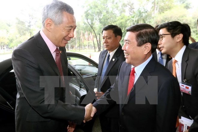 PM Singapura, Lee Hsien Loong memulai kunjungan resmi di Vietnam - ảnh 1