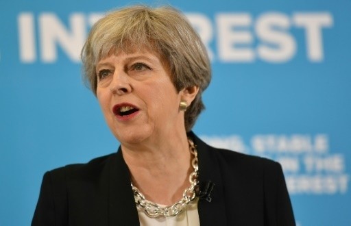 Royaume-Uni: Theresa May veut limiter l'immigration hors UE - ảnh 1