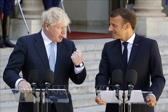 Brexit: à Paris, Boris Johnson et Emmanuel Macron veulent croire à un accord - ảnh 1