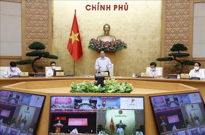 Pham Minh Chinh: Il faut éviter à tout prix une crise économique et sanitaire - ảnh 1