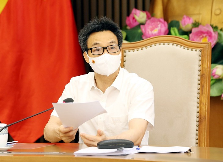 ค้ำประกันการแจกจ่ายวัคซีนป้องกันโควิด-19 ตามแผนการที่วางไว้ - ảnh 1