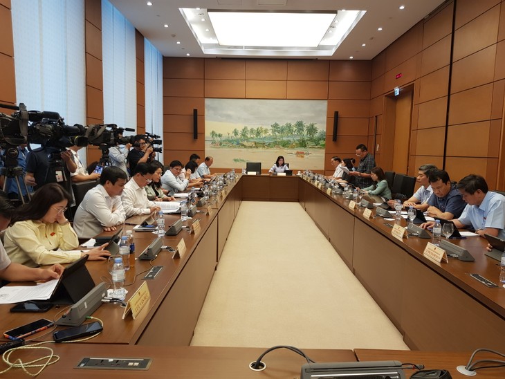 สภาแห่งชาติหารือเกี่ยวกับร่างกฎหมายฉบับแก้ไขและเพิ่มเติมข้อกำหนดของกฎหมายสถานประกอบการ - ảnh 2